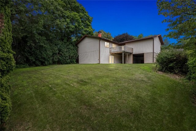 1131 Penkridge Dr, Iowa City, IA 52246 - view of green lawn featuring a wooden deck