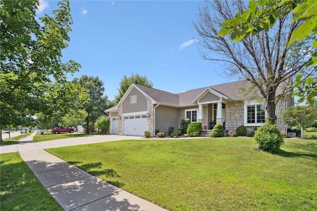 5512 Black Oak Dr NE, Cedar Rapids, IA 52411 - view of front of property featuring stone siding, a garage, a front lawn, and driveway
