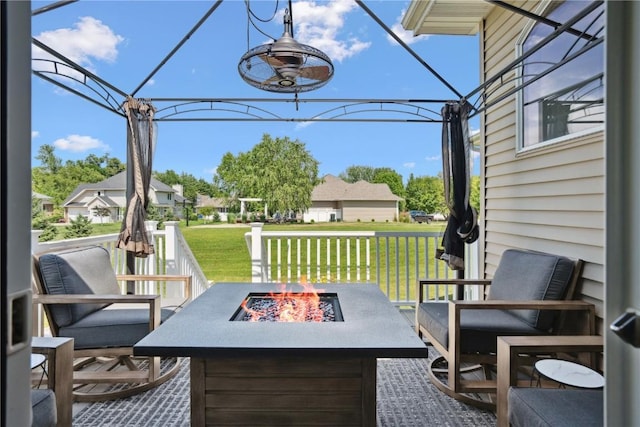5512 Black Oak Dr NE, Cedar Rapids, IA 52411 - view of patio / terrace featuring an outdoor fire pit