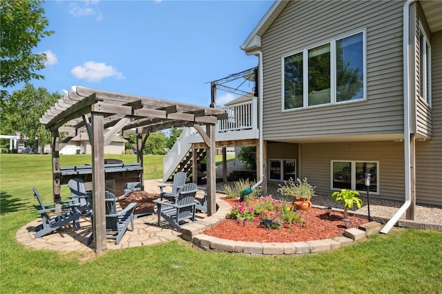 5512 Black Oak Dr NE, Cedar Rapids, IA 52411 - view of patio / terrace with an outdoor fire pit, a wooden deck, and stairs