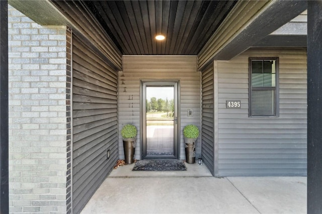 4395 Rec Dr, Marion, IA 52302 - entrance to property featuring brick siding