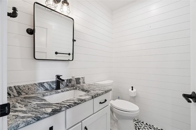 4395 Rec Dr, Marion, IA 52302 - bathroom featuring vanity and wood walls