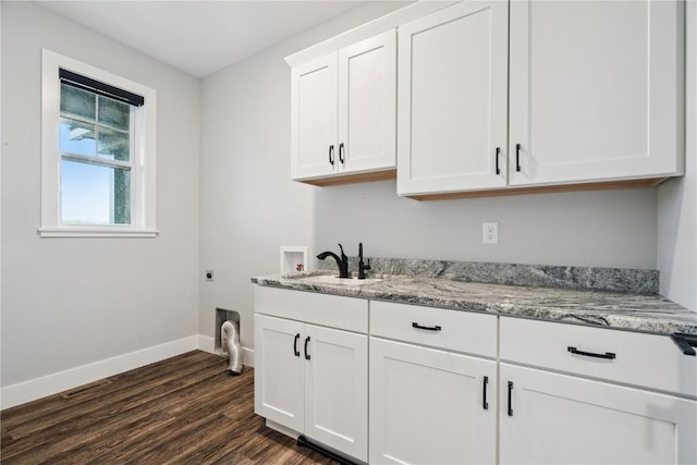 4395 Rec Dr, Marion, IA 52302 - laundry room featuring washer hookup, cabinet space, dark wood-style flooring, and hookup for an electric dryer