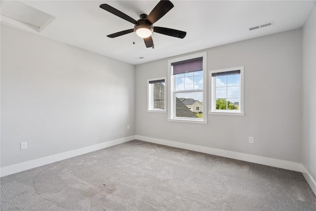 4395 Rec Dr, Marion, IA 52302 - carpeted spare room featuring a ceiling fan and attic access