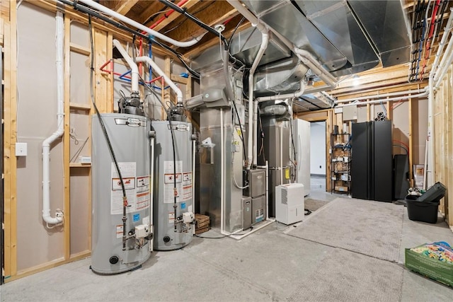 4395 Rec Dr, Marion, IA 52302 - unfinished basement with water heater, freestanding refrigerator, and heating unit