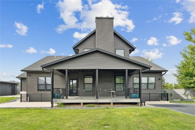 4395 Rec Dr, Marion, IA 52302 - rear view of property featuring a chimney
