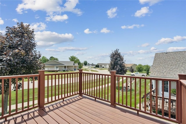 247 Kelso Ln, Fairfax, IA 5228 - wooden terrace featuring a residential view and a lawn