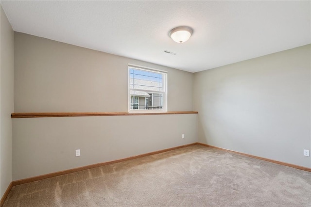 247 Kelso Ln, Fairfax, IA 5228 - carpeted empty room with baseboards