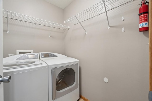 247 Kelso Ln, Fairfax, IA 5228 - laundry area featuring washer and clothes dryer