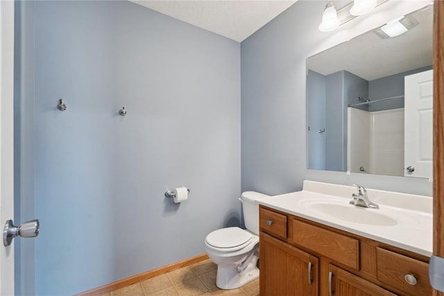 247 Kelso Ln, Fairfax, IA 5228 - bathroom with vanity, a shower, and tile patterned floors