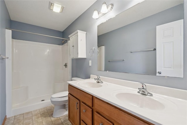 247 Kelso Ln, Fairfax, IA 5228 - full bathroom featuring double vanity and a shower