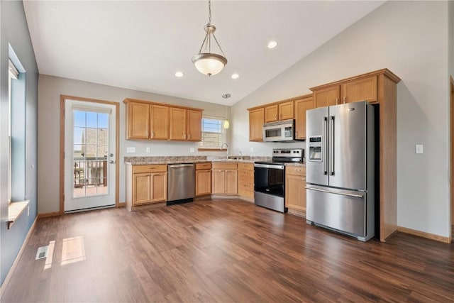 247 Kelso Ln, Fairfax, IA 5228 - kitchen featuring stainless steel appliances, light countertops, dark wood-style flooring, pendant lighting, and vaulted ceiling