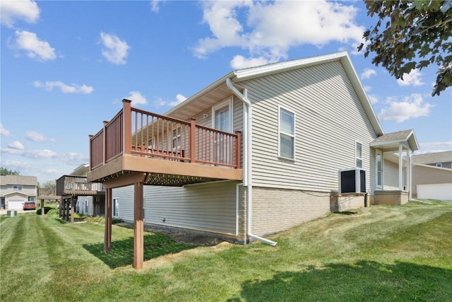 247 Kelso Ln, Fairfax, IA 5228 - view of side of home featuring a wooden deck and a yard