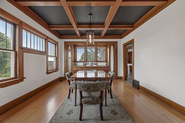 308 Main St, Norway, IA 52318 - dining area featuring light wood finished floors, beam ceiling, and coffered ceiling