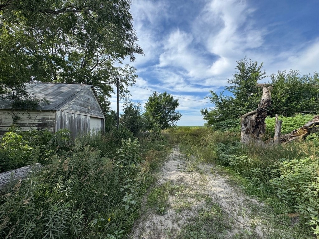 1961 140th St, Wellman, IA 52356 - view of yard featuring an outbuilding