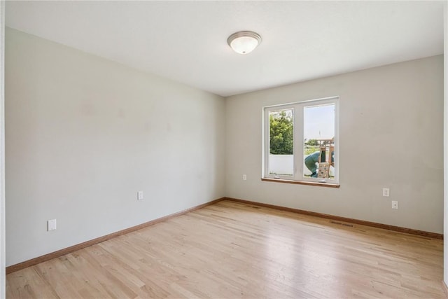 405 Linn Dr, Palo, IA 52324 - empty room with light wood finished floors