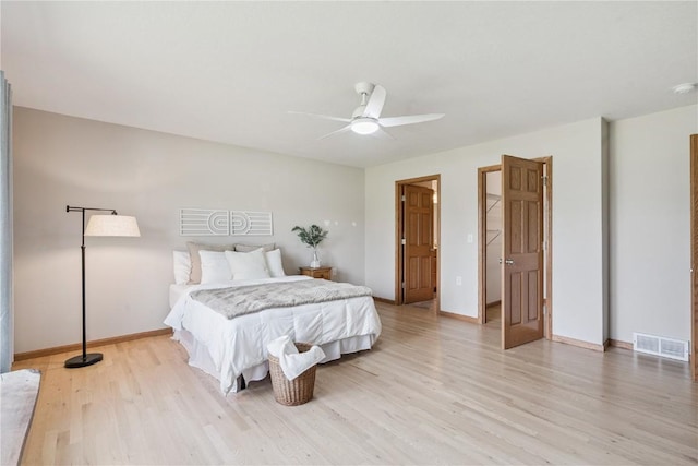405 Linn Dr, Palo, IA 52324 - bedroom with light wood-type flooring and a ceiling fan