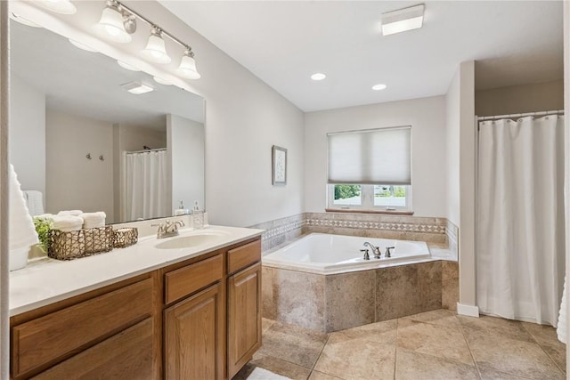 405 Linn Dr, Palo, IA 52324 - bathroom with vanity, a garden tub, tile patterned flooring, and a shower with curtain