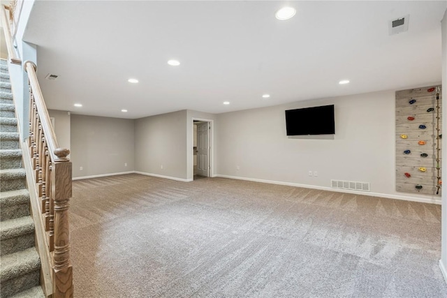 405 Linn Dr, Palo, IA 52324 - finished basement with carpet floors, stairway, and recessed lighting
