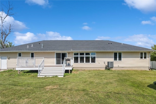 405 Linn Dr, Palo, IA 52324 - back of property with a deck, a lawn, and roof with shingles
