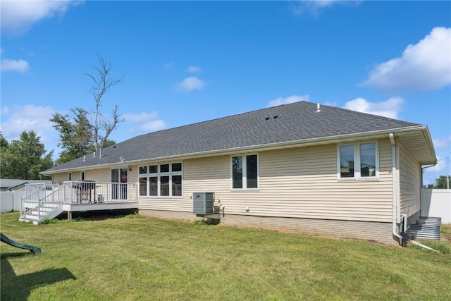 405 Linn Dr, Palo, IA 52324 - back of property featuring a wooden deck, a yard, and roof with shingles