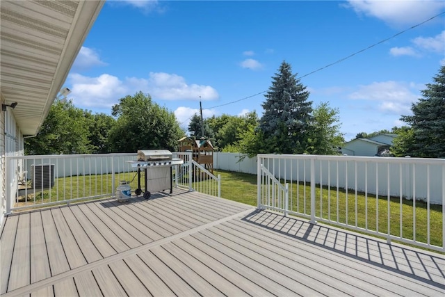 405 Linn Dr, Palo, IA 52324 - deck with a playground, a fenced backyard, and area for grilling