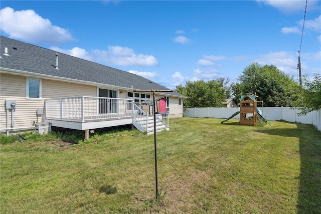 405 Linn Dr, Palo, IA 52324 - fenced backyard with a deck and a playground