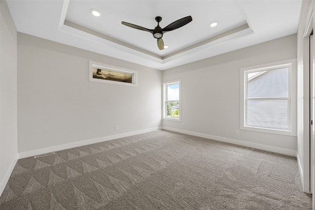 4018 Peridot Dr, Marion, IA 52302 - carpeted spare room with a raised ceiling, recessed lighting, and ceiling fan