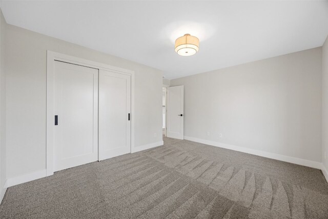 4018 Peridot Dr, Marion, IA 52302 - unfurnished bedroom featuring carpet flooring and a closet