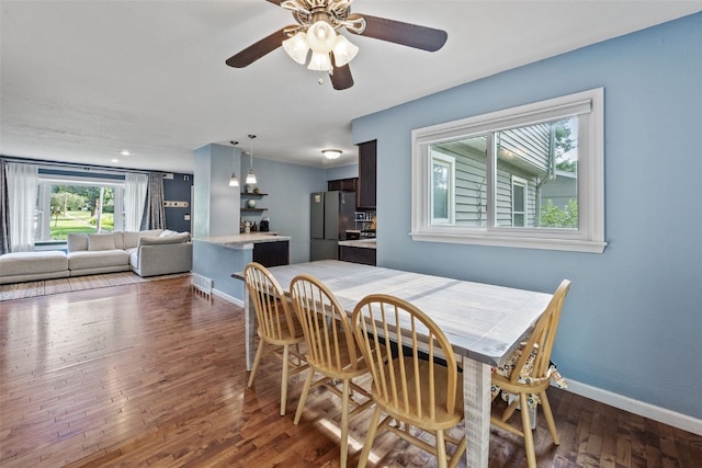 1608 10th St, Coralville, IA 52241 - dining room with wood finished floors and ceiling fan
