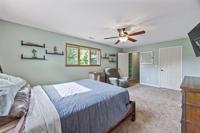 1608 10th St, Coralville, IA 52241 - bedroom with carpet and a ceiling fan