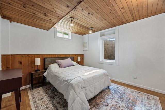 1608 10th St, Coralville, IA 52241 - bedroom with wooden ceiling and wood finished floors