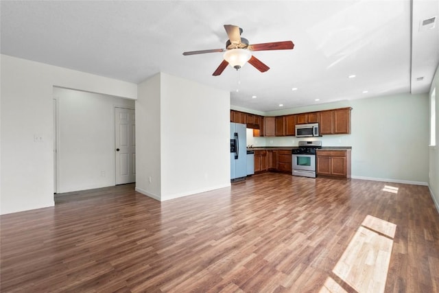 3107 Johnson Ave NW Unit 4, Cedar Rapids, IA 52405 - unfurnished living room featuring ceiling fan, recessed lighting, and wood finished floors