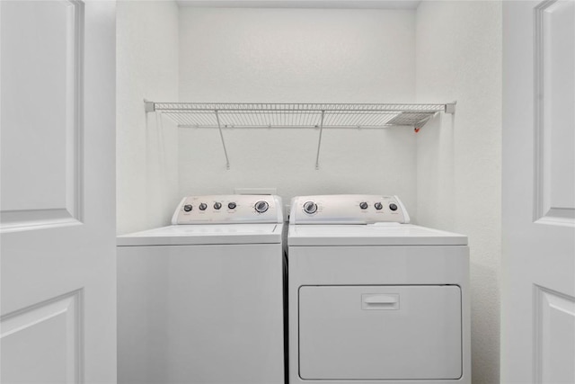 3107 Johnson Ave NW Unit 4, Cedar Rapids, IA 52405 - washroom featuring washer and dryer