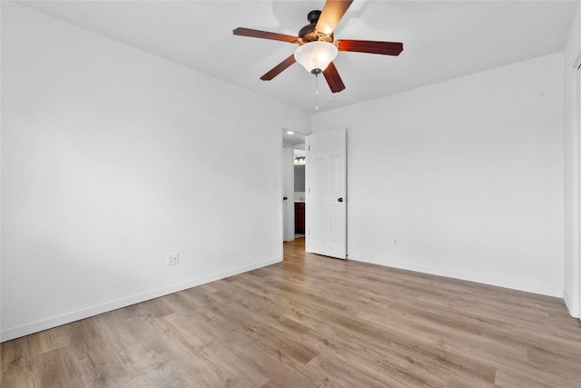 3107 Johnson Ave NW Unit 4, Cedar Rapids, IA 52405 - unfurnished room featuring light wood-style floors and ceiling fan
