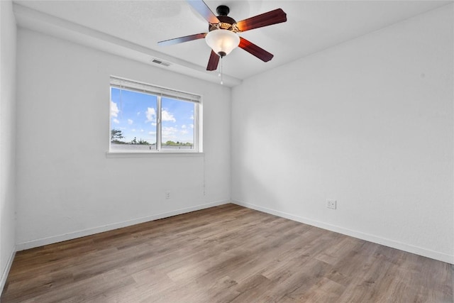 3107 Johnson Ave NW Unit 4, Cedar Rapids, IA 52405 - spare room featuring wood finished floors and a ceiling fan