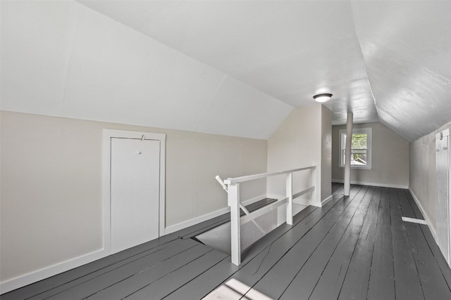 2225 SE Mount Vernon Rd, Cedar Rapids, IA 52403 - bonus room with dark wood-type flooring and lofted ceiling