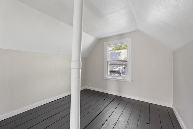 2225 SE Mount Vernon Rd, Cedar Rapids, IA 52403 - bonus room with hardwood / wood-style flooring, vaulted ceiling, and a textured ceiling