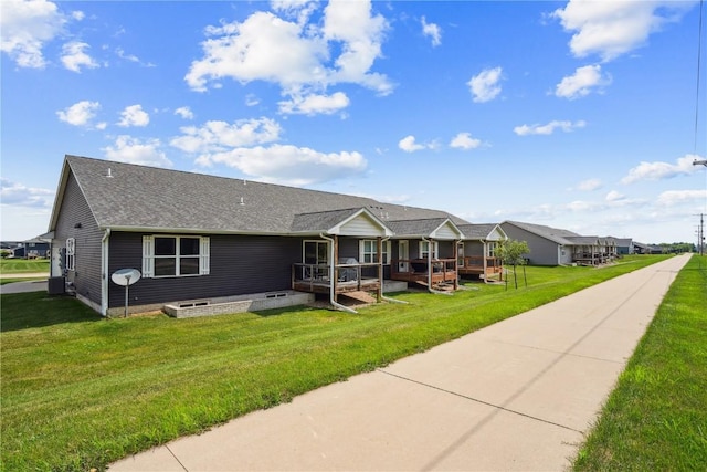 3016 Sherwood Dr, Marion, IA 52302 - view of front of property with a front lawn and roof with shingles