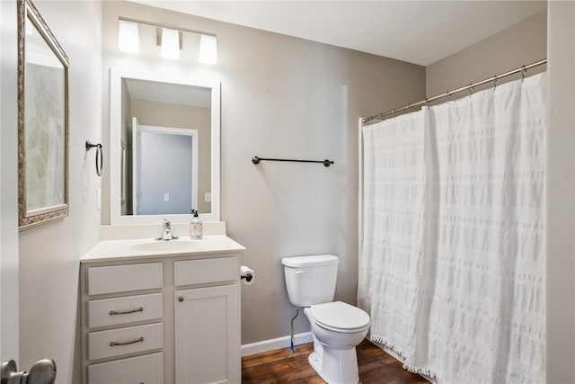 3016 Sherwood Dr, Marion, IA 52302 - full bathroom featuring vanity and wood finished floors