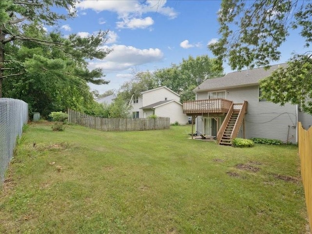 2007 S Ridge Dr, Coralville, IA 52241 - fenced backyard featuring stairs and a deck