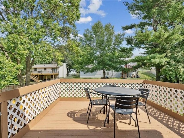 2007 S Ridge Dr, Coralville, IA 52241 - wooden deck with outdoor dining space