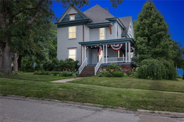 103 10th Ave SW, Mount Vernon, IA 52314 - victorian house with a porch and a front yard