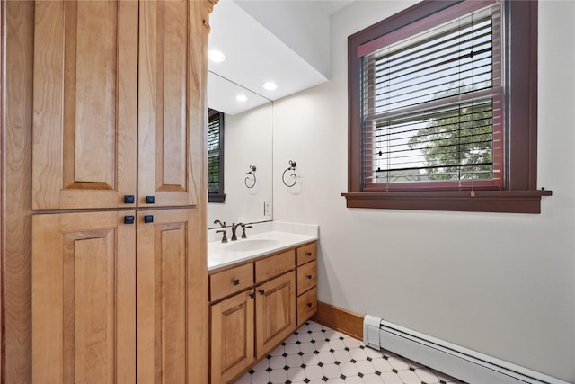 103 10th Ave SW, Mount Vernon, IA 52314 - bathroom with a baseboard radiator, tile patterned floors, vanity, plenty of natural light, and recessed lighting