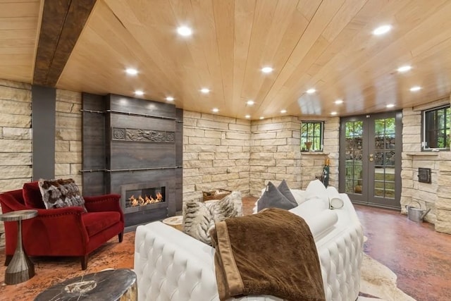 404 Brown St, Iowa City, IA 52245 - living area with a glass covered fireplace, wood ceiling, and recessed lighting