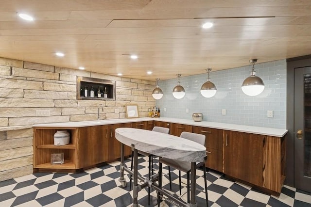 404 Brown St, Iowa City, IA 52245 - community bar area featuring light floors and decorative light fixtures