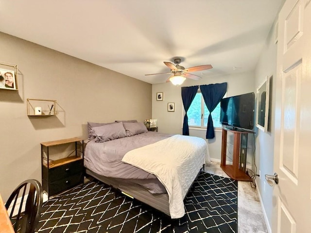 104 Oberlin St, Iowa City, IA 52245 - carpeted bedroom featuring a ceiling fan and baseboards