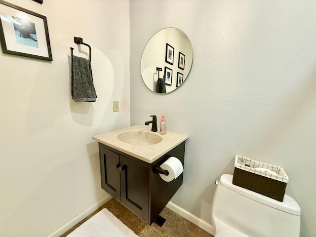 104 Oberlin St, Iowa City, IA 52245 - bathroom featuring baseboards and vanity