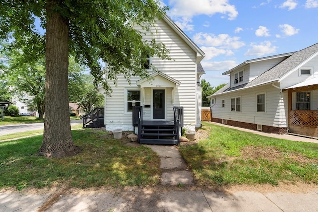 1356 Hinkley Ave NW, Cedar Rapids, IA 52405 - view of front of house featuring a front lawn