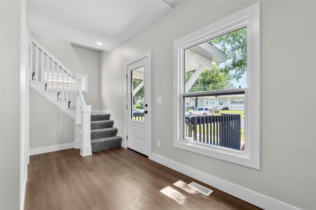 1356 Hinkley Ave NW, Cedar Rapids, IA 52405 - foyer with wood finished floors, stairs, and recessed lighting